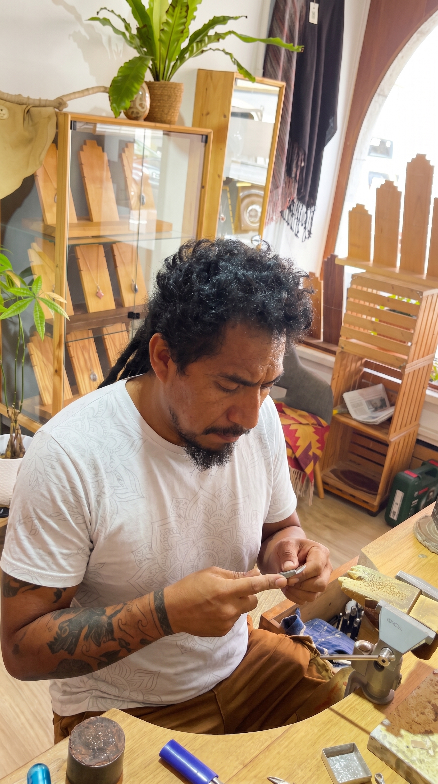 Portrait of Yonatan Torres at his workshop
